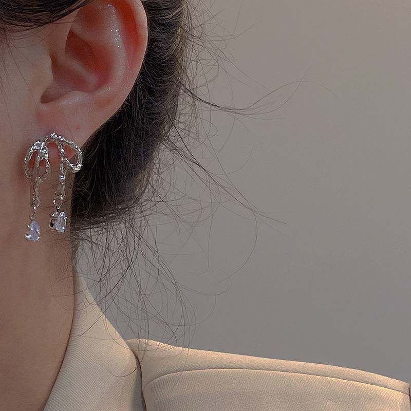 Niche design texture stone bow earrings ins sweet cool cold wind irregular ribbon high-end sense earrings female