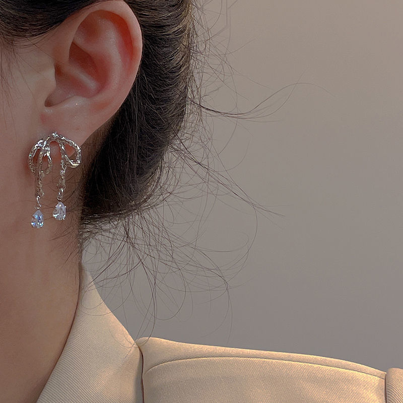 Niche design texture stone bow earrings ins sweet cool cold wind irregular ribbon high-end sense earrings female