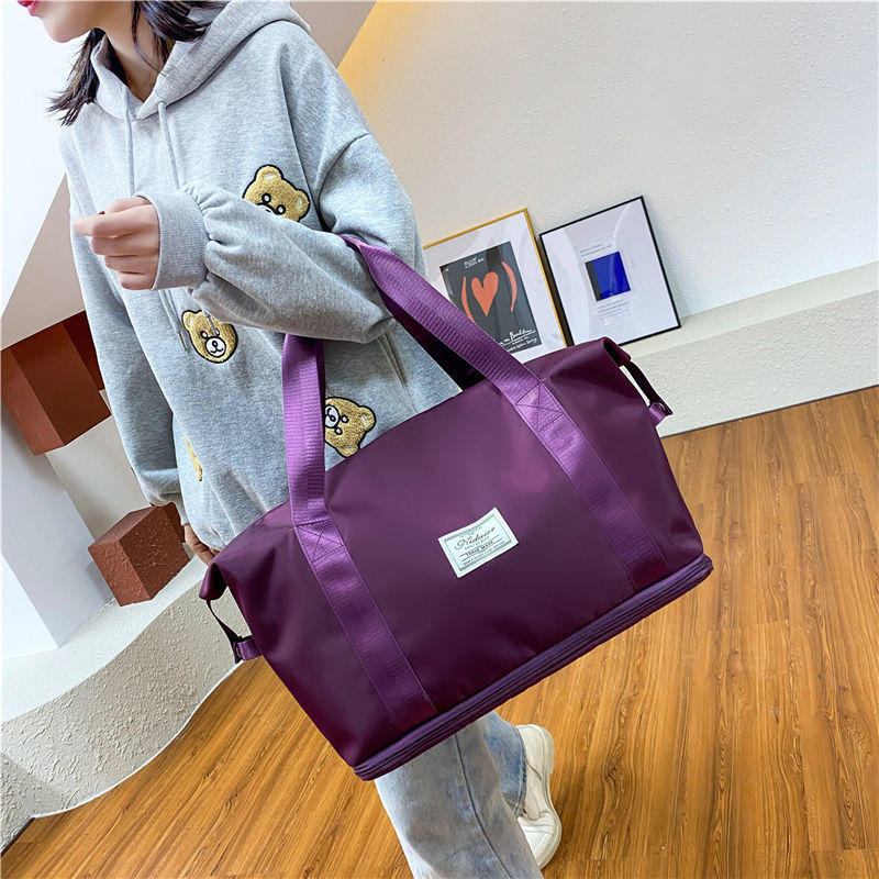 Large-capacity travel bag women's short-distance luggage bag large-capacity portable travel bag lightweight waterproof ready-to-birth bag storage bag