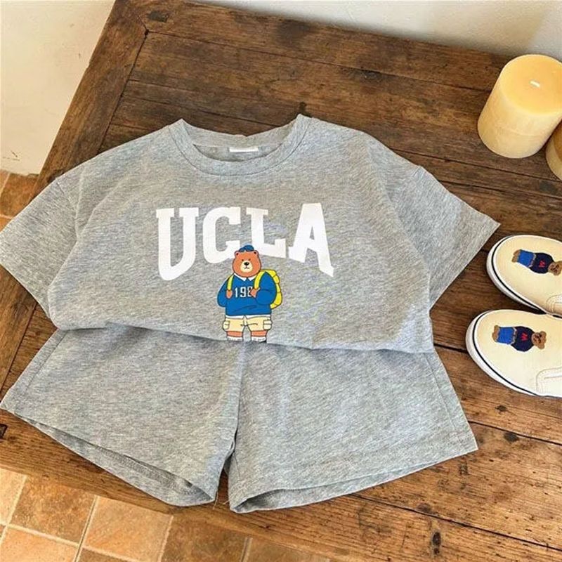 Children's cotton sports suit summer new boys and girls foreign style cartoon leisure two-piece set baby short-sleeved + shorts