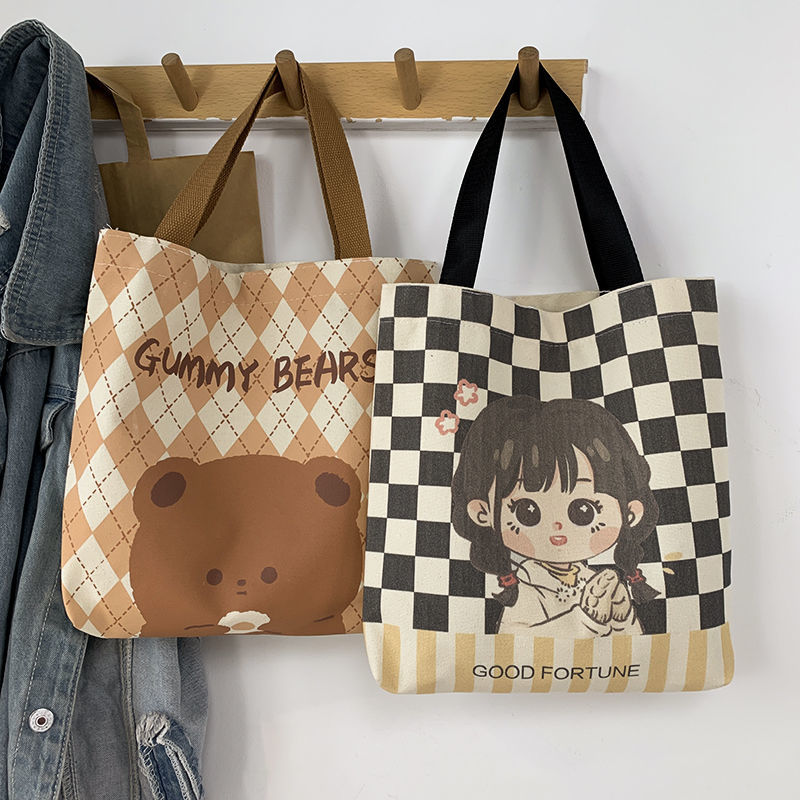 Canvas bag for women, simple and versatile for students to carry books in class, portable lunch boxes for women, trendy bags for flat lunch boxes