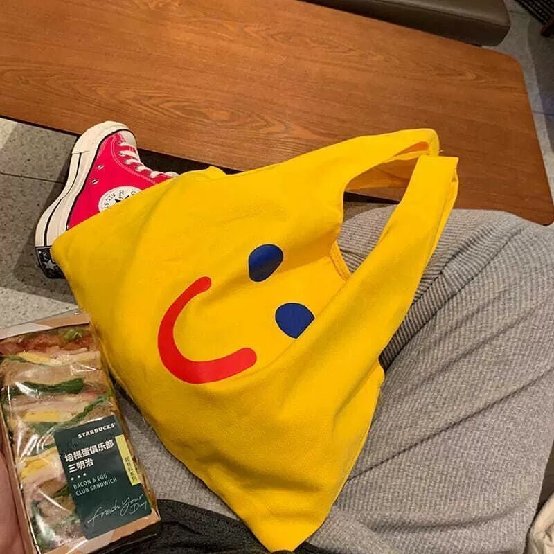 INS Network Red Handheld Canvas Bag, Cute Smiling Face Handheld Bag, Japanese and Korean Version Handheld Versatile Fabric Bag, Rice Box Bag