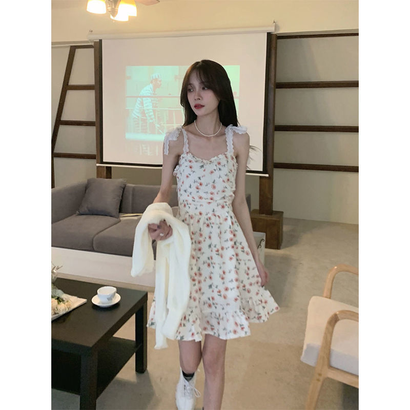 Sweet and spicy wind floral suspender dress set women's spring and summer thin knitted Cape cardigan sweet waist short skirt