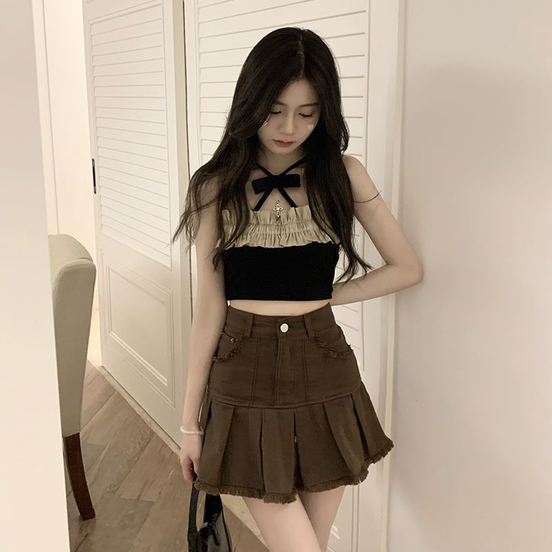 Spice girl brown denim skirt female ins summer 2023. New design sense niche raw edge pleated skirt