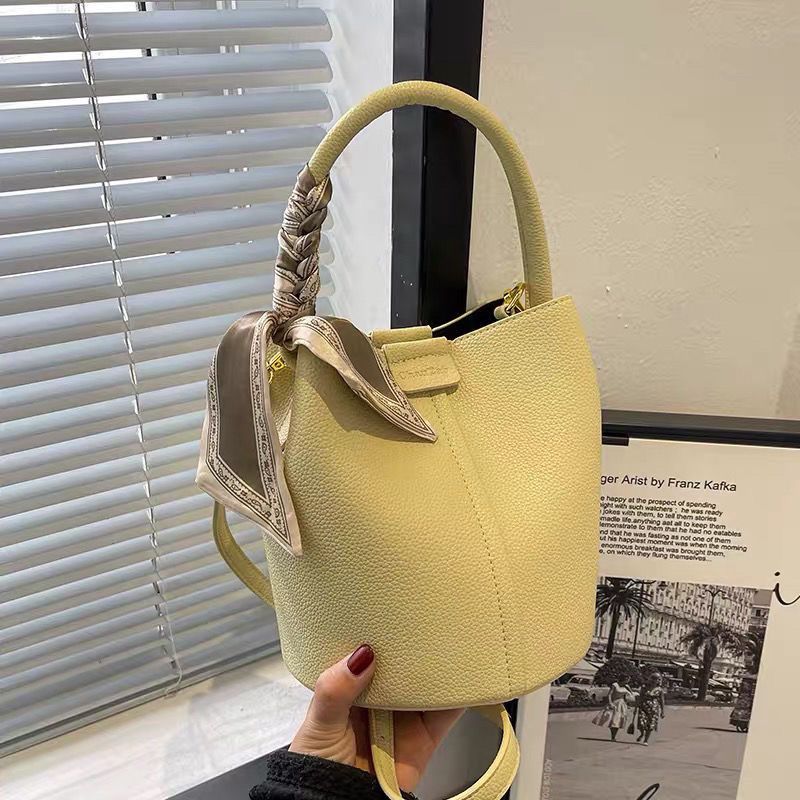 High-end bags for women summer 2023 new textured silk scarf shoulder bag niche western style crossbody large capacity bucket bag