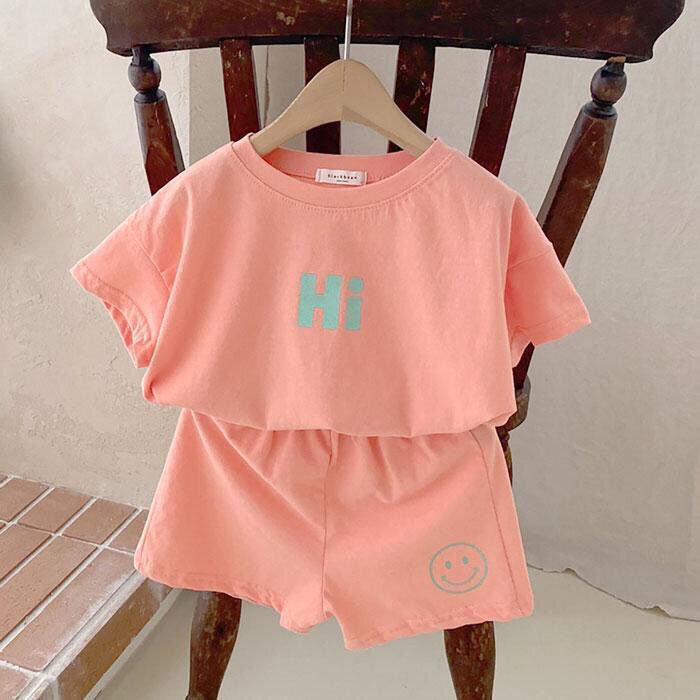 Infants and children's clothing candy color Korean casual short-sleeved suit letter smiley T-shirt shorts two-piece set
