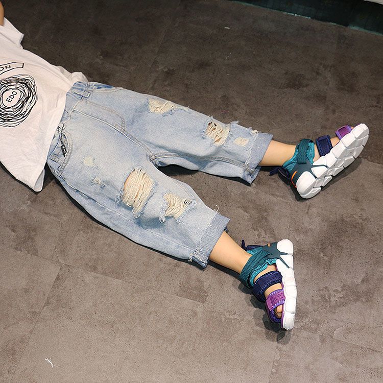 Children's ripped jeans summer boy baby outerwear thin section children's loose fashionable seven-point beggar pants