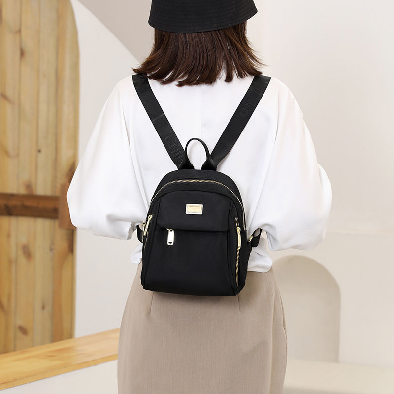 女士旅游双肩背包女牛津新款新款时尚简约帆布女背包防水书包