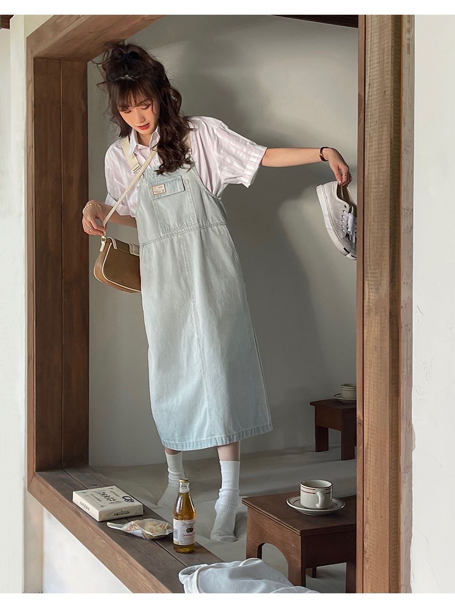 Pure color denim suspender skirt women's summer new Korean version loose and age-reducing small man mid-length straight dress