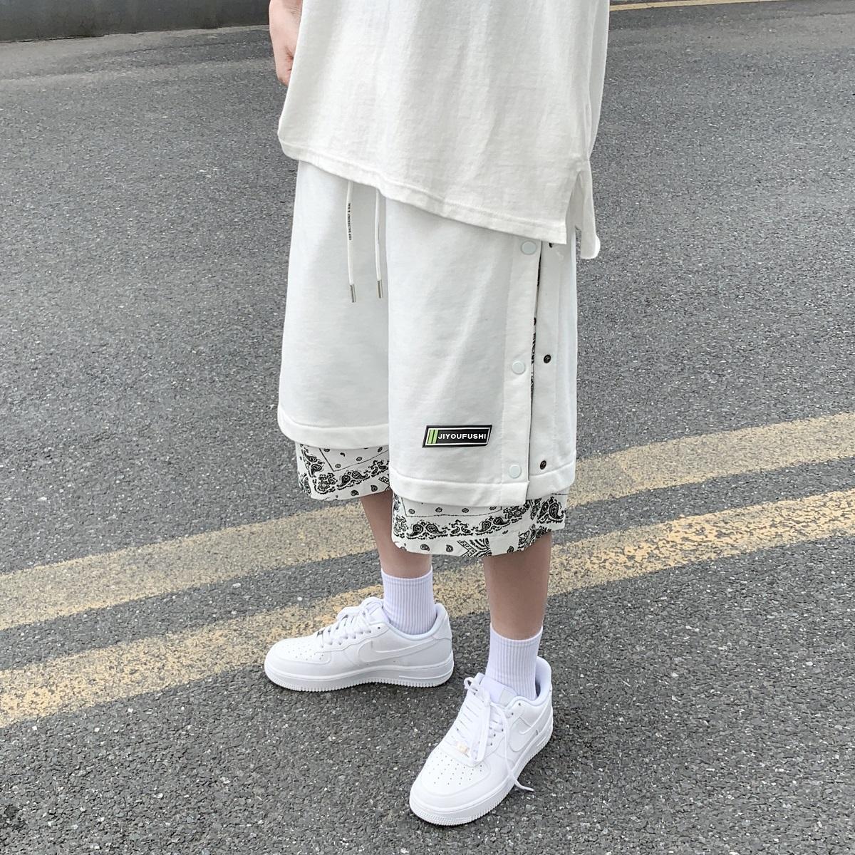 Side-breasted stitching cashew flower casual shorts men's trendy ins fake two-piece loose sports beach five-point pants
