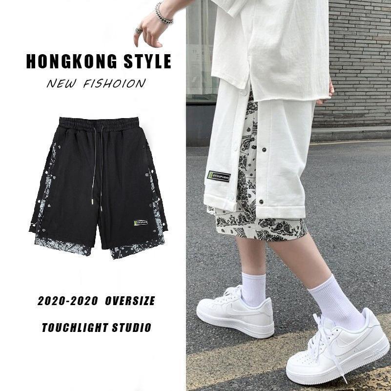 Side-breasted stitching cashew flower casual shorts men's trendy ins fake two-piece loose sports beach five-point pants