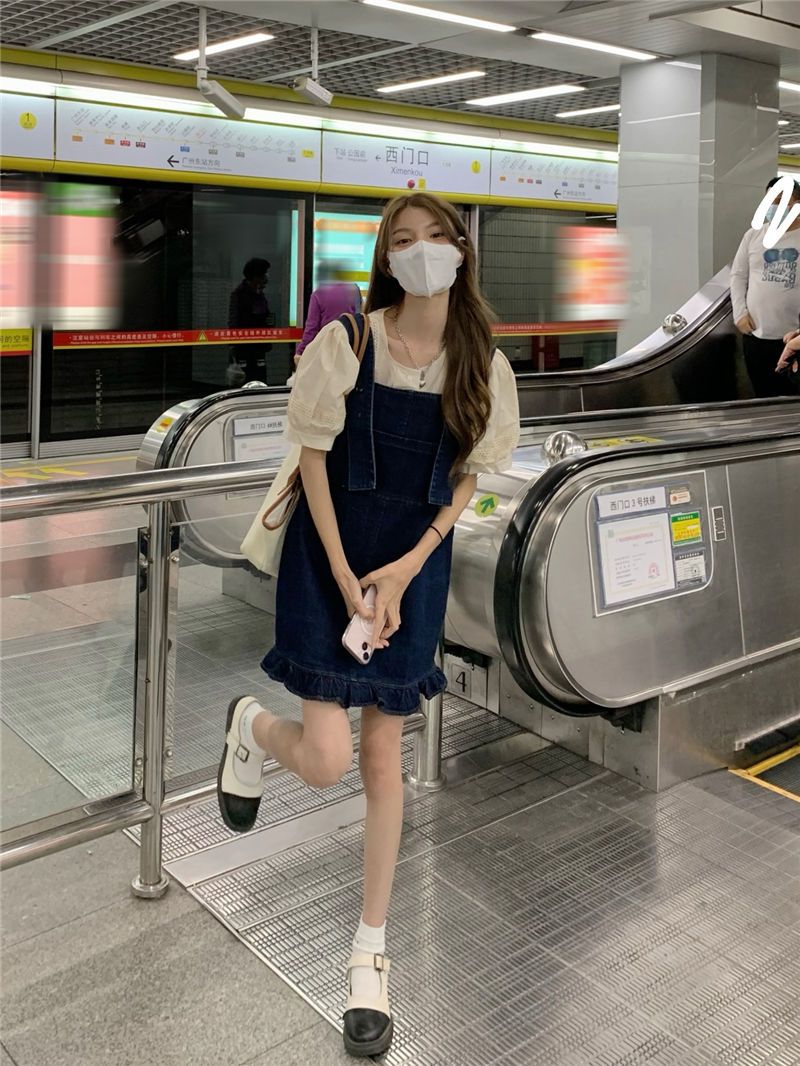 Denim suspender skirt women's summer 2022 new Korean style wood ear side design sense of loose skin-covering outerwear dress