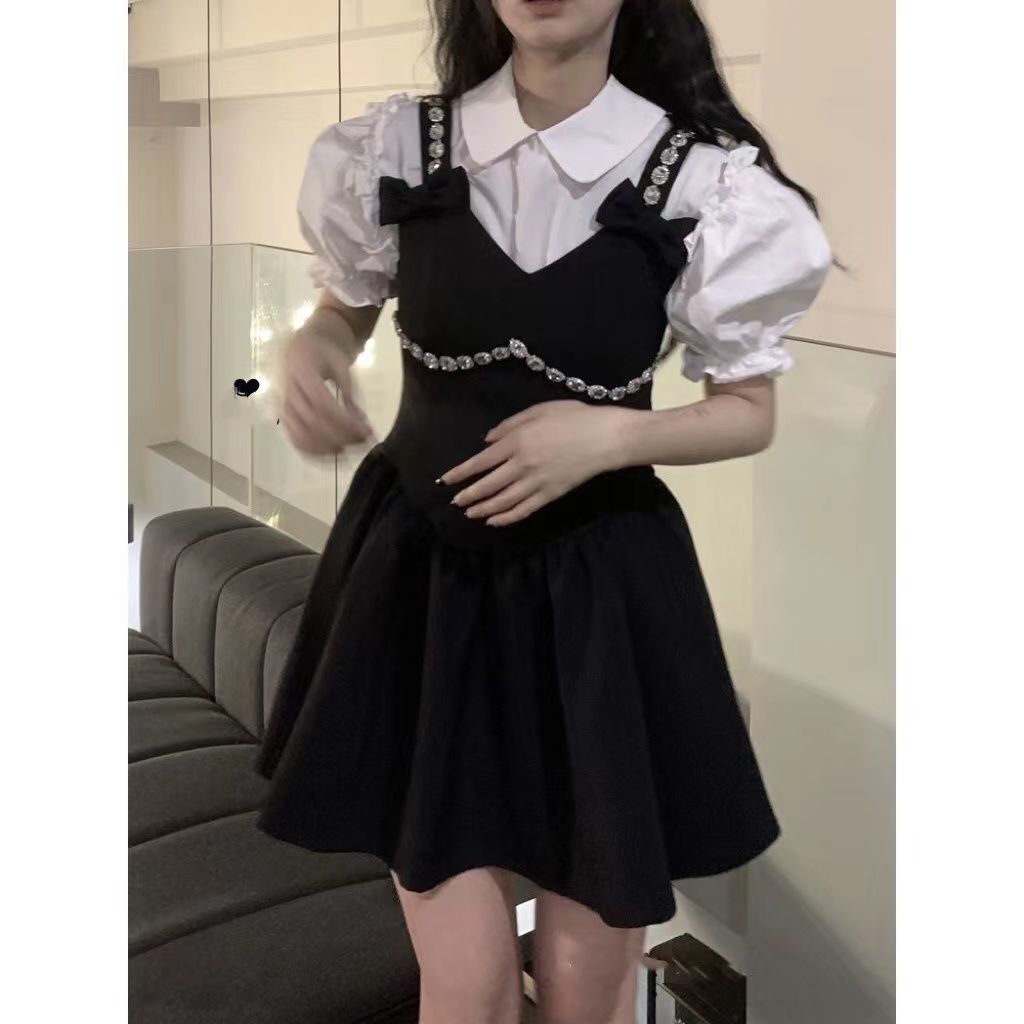 法式蝴蝶結黑色連衣裙女2023年新款夏季小眾設計背帶裙子a字短裙