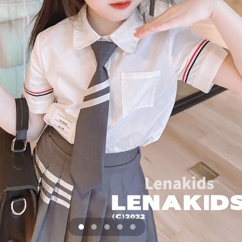 Girls' suit new short-sleeved shirt children's niche trend pleated skirt Wang Xinling's same western style suit tide