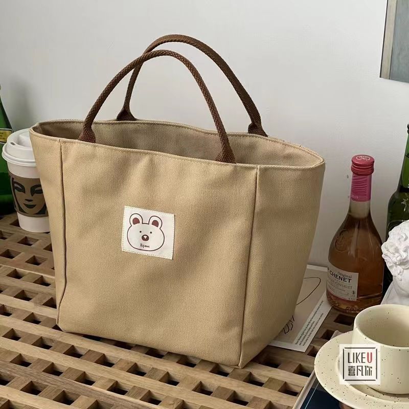 原創日系小水桶型托特帆布包簡約百搭文藝單肩手提包便當餐盒包女