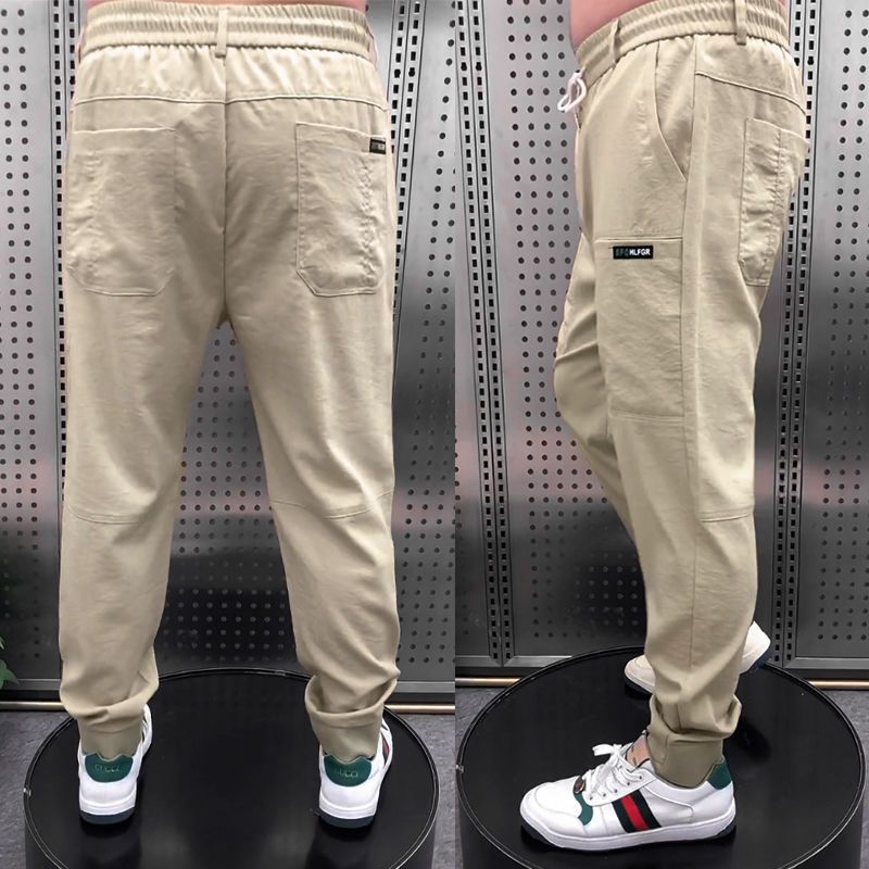Solid color cotton and linen six-pocket casual pants for men 2022 summer thin Internet celebrity bound feet middle-aged slim small feet harem pants trendy