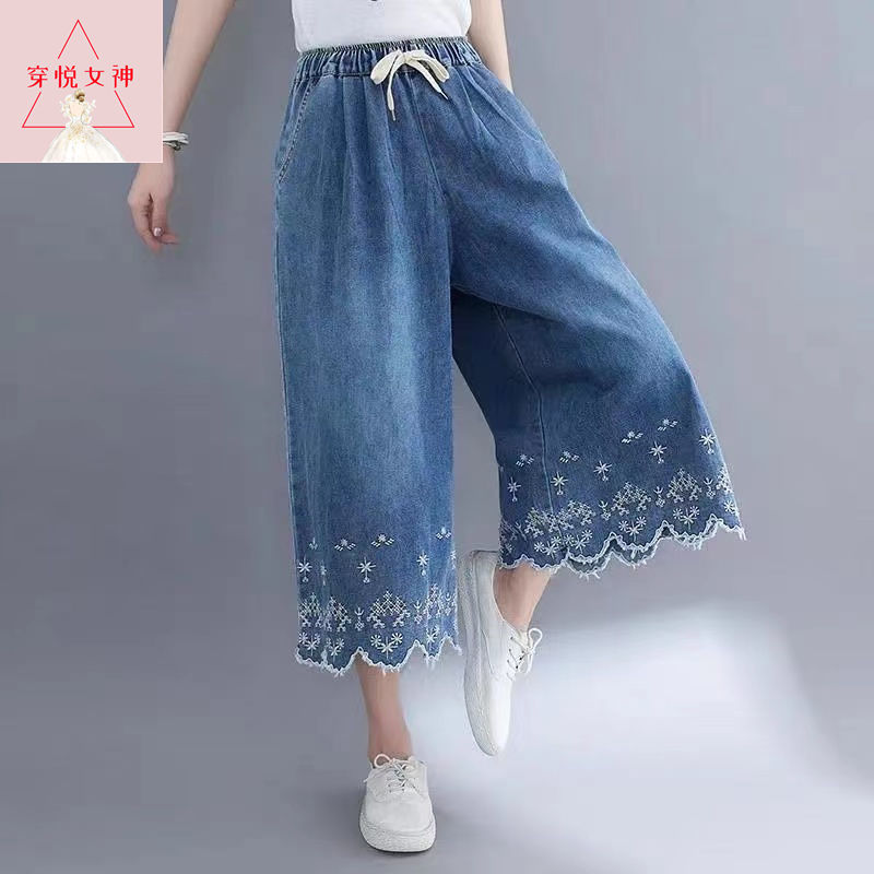 80-200斤時尚文藝刺繡鬆緊腰牛仔闊腿褲女新款大碼寬鬆遮肉七分褲