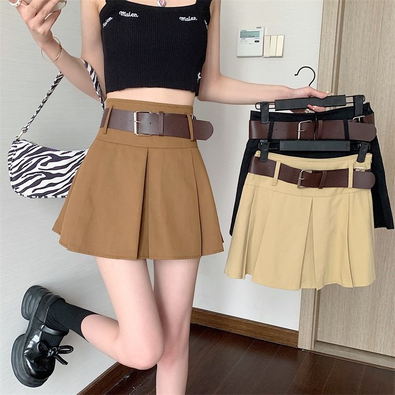 American retro pleated skirt for women's spring and summer new high waisted spicy girl A-line skirt, small black ultra short skirt