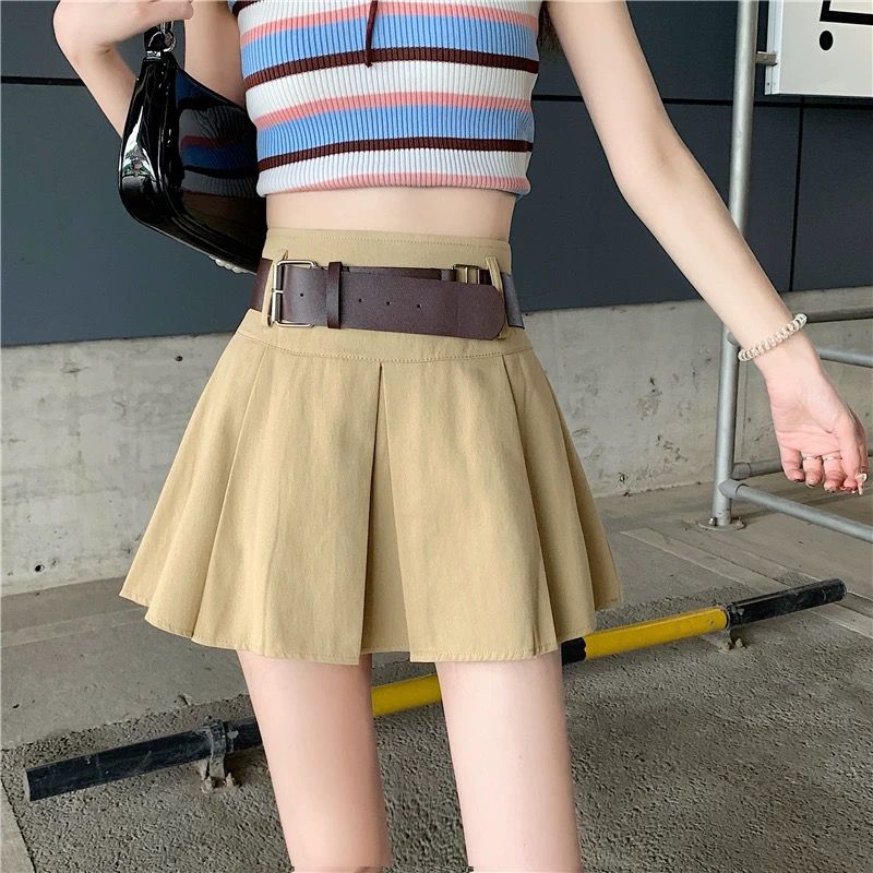 American retro pleated skirt for women's spring and summer new high waisted spicy girl A-line skirt, small black ultra short skirt