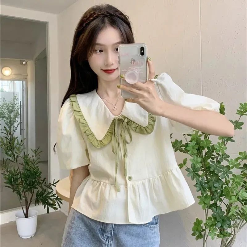 Doll collar puff sleeve shirt women's design sense niche summer new gentle wind Korean sweet short top