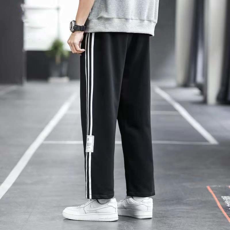 Hong Kong style casual pants men's design striped drape high street fashion brand ins loose straight student sports pants