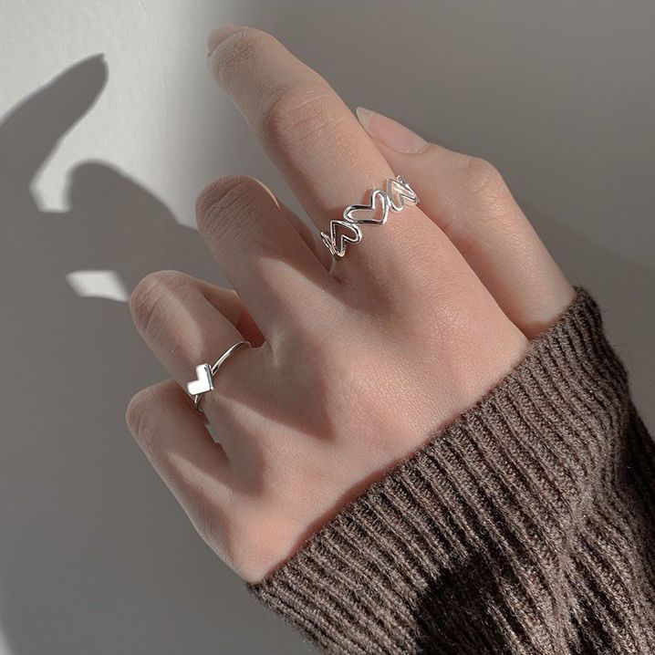 Hollow love ring women's fashionable personality simple niche design high-end light luxury cold style open index finger ring