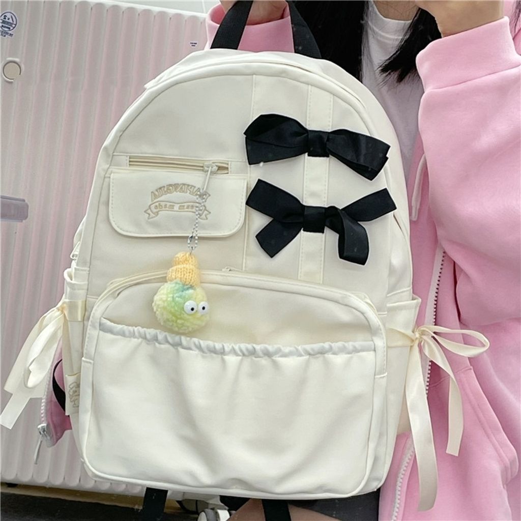 Japanese girl schoolbag female Korean version middle school student ins style bow cute high school student college student backpack