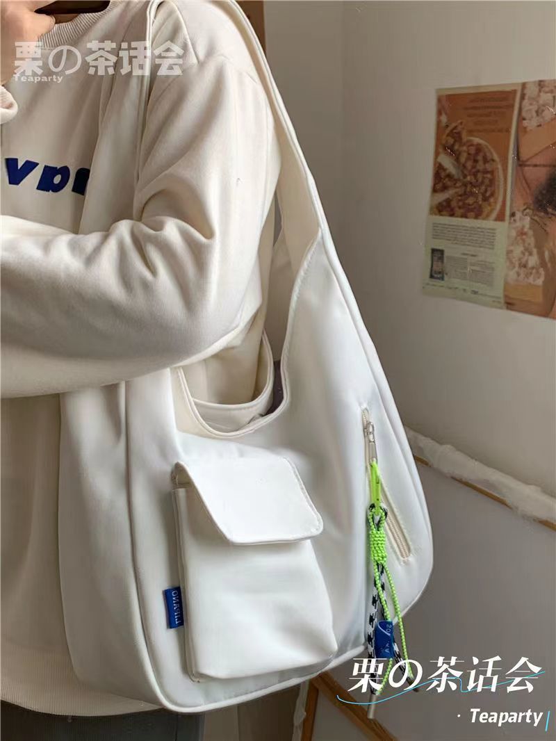 韩版简约帆布包包女夏新款文艺大容量单肩托特包学生上课书包