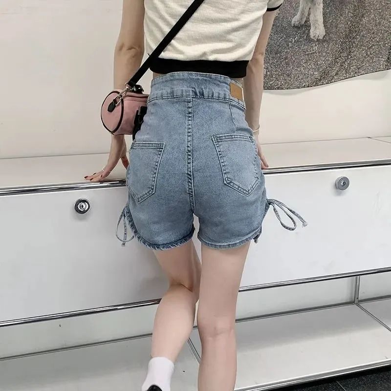 Drawstring denim shorts women's summer loose Korean version 2022 new design hot girl high waist slim a-line hot pants women