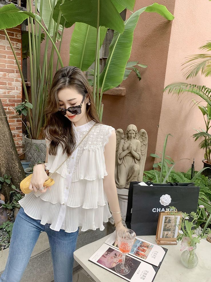 Hollow white sleeveless lace chiffon shirt women's summer new temperament design sense niche fashion top