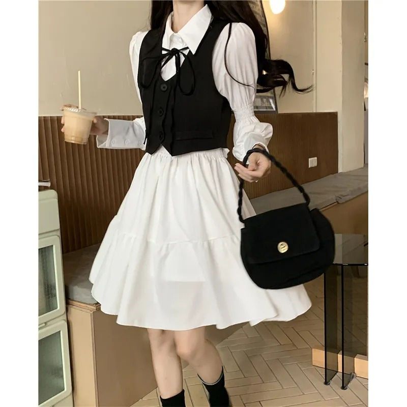 2022 Spring and Autumn Temperament Goddess Fan college style polo collar long-sleeved dress + black vest fashion two-piece set
