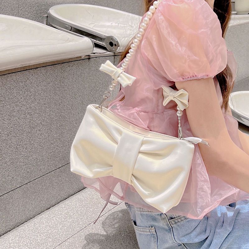 少女珍珠蝴蝶結腋下女包2022新款小清新仙女包韓版單肩手提斜挎包