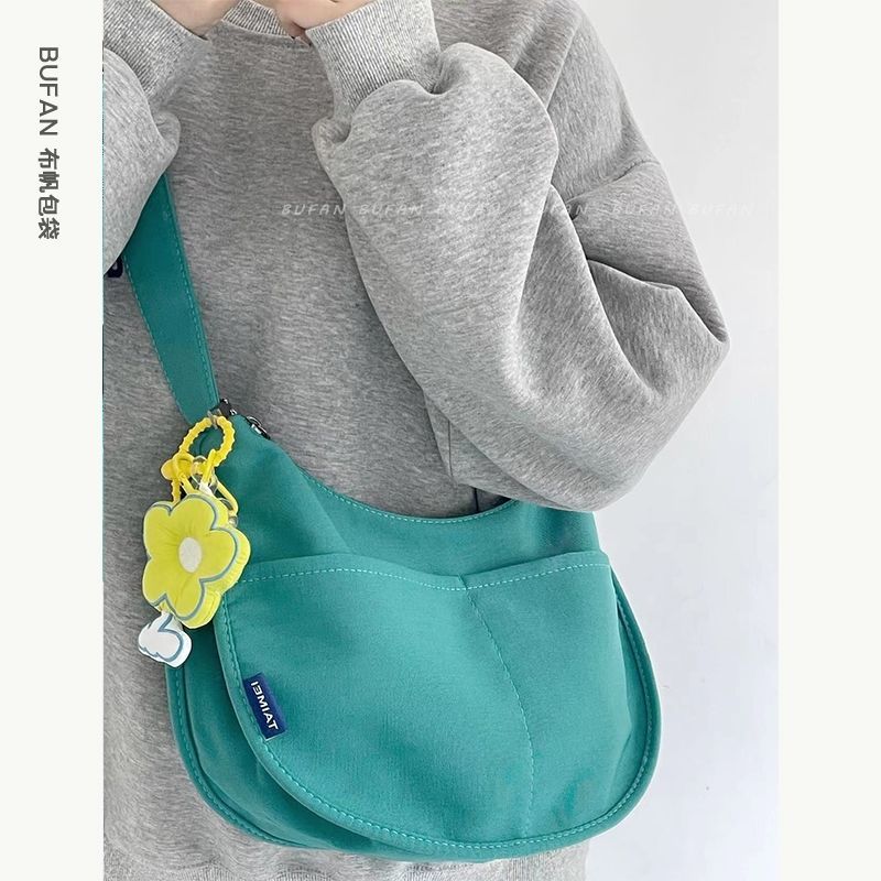 2022 new forest canvas bag female student campus tide summer fashion all-match oblique cross western style shoulder bag