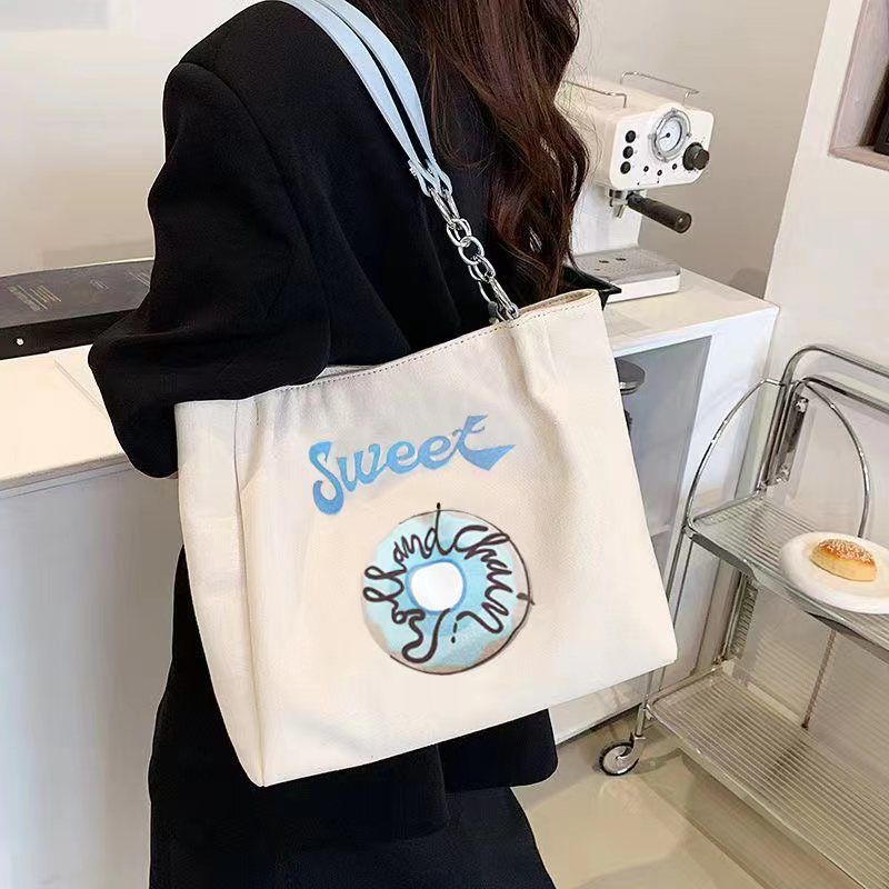 包包女2023新款大容量帆布包甜圈圈刺繡收納腋下包百搭小眾托特包