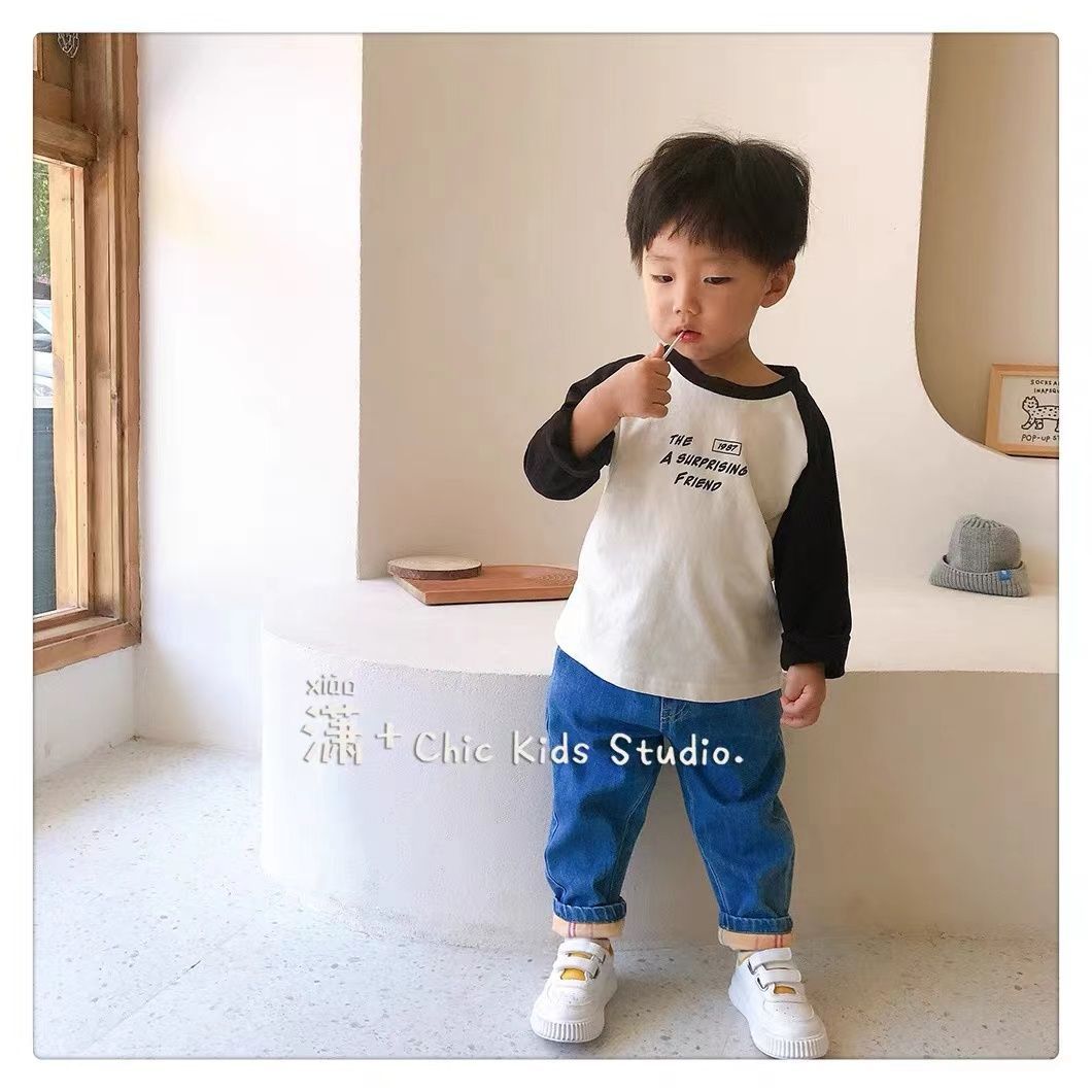 Boys' long-sleeved t-shirt 2022 autumn new children's color-blocking simple top baby print western style bottoming shirt trend