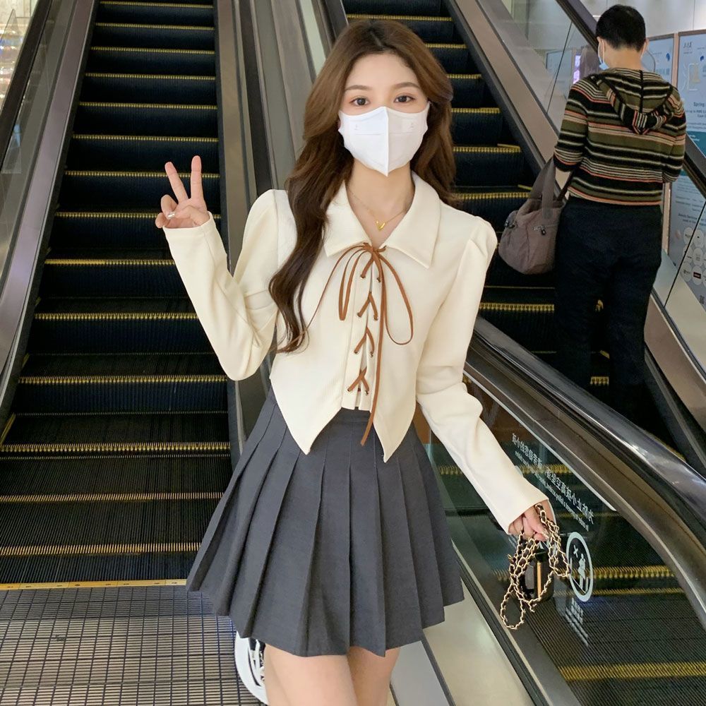 設計感polo領春秋不規則甜辣綁帶T恤女氣質小眾別致心機修身上衣