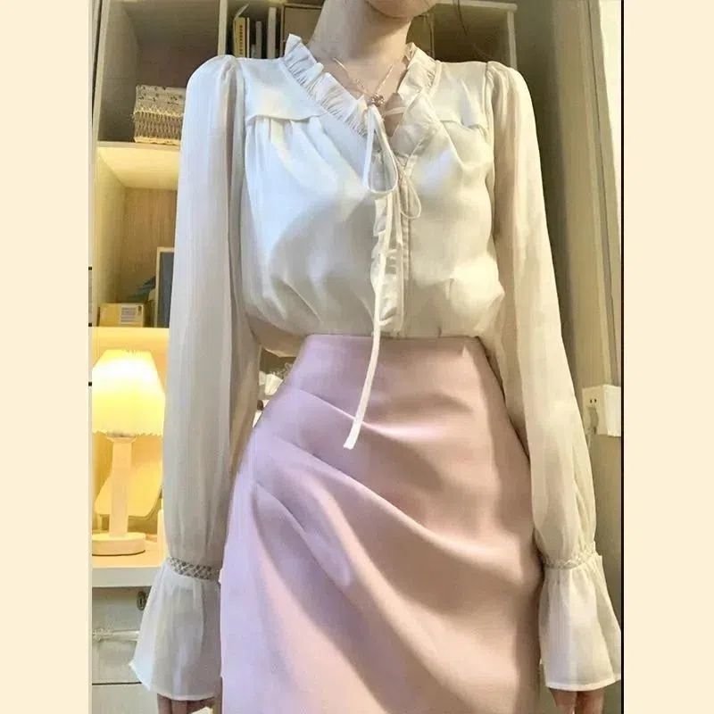 Suit women's 2023 spring new French puff sleeve v-neck top + temperament high waist bag hip skirt two-piece set