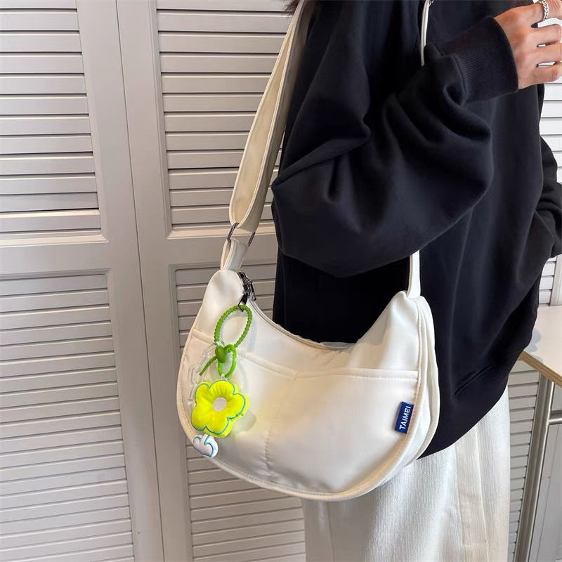 Canvas bag female  new large-capacity simple college students commuting to class one-shoulder Messenger bag ins dumpling bag