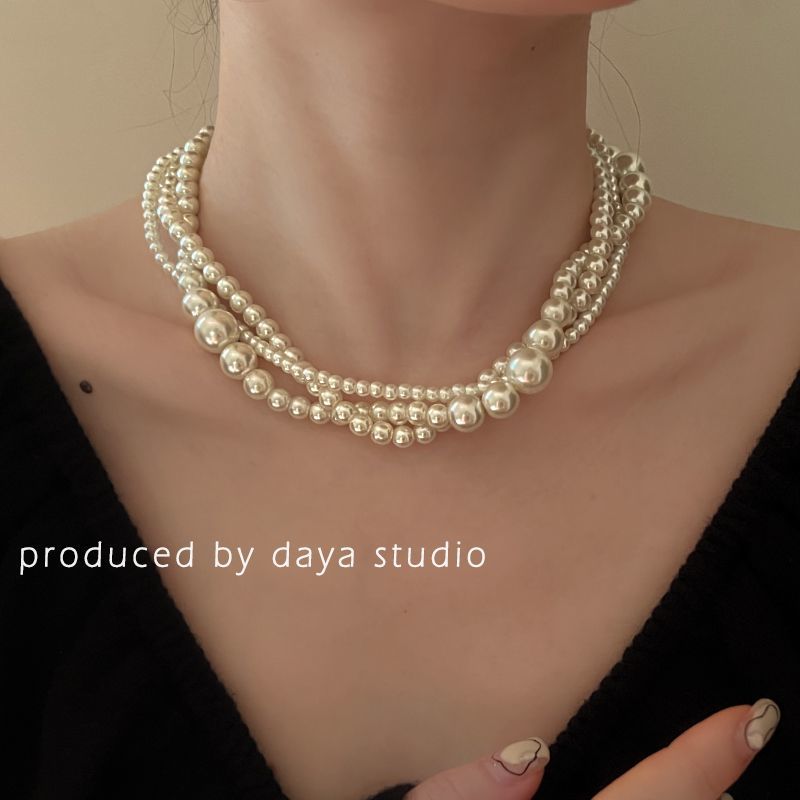 Ins French retro multi-layer pearl necklace light luxury high-end niche design temperament twist winding clavicle chain