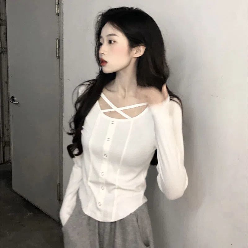 New style niche hot girls slim hollow fashion T-shirt women's early autumn self-cultivation all-match irregular cross long-sleeved top