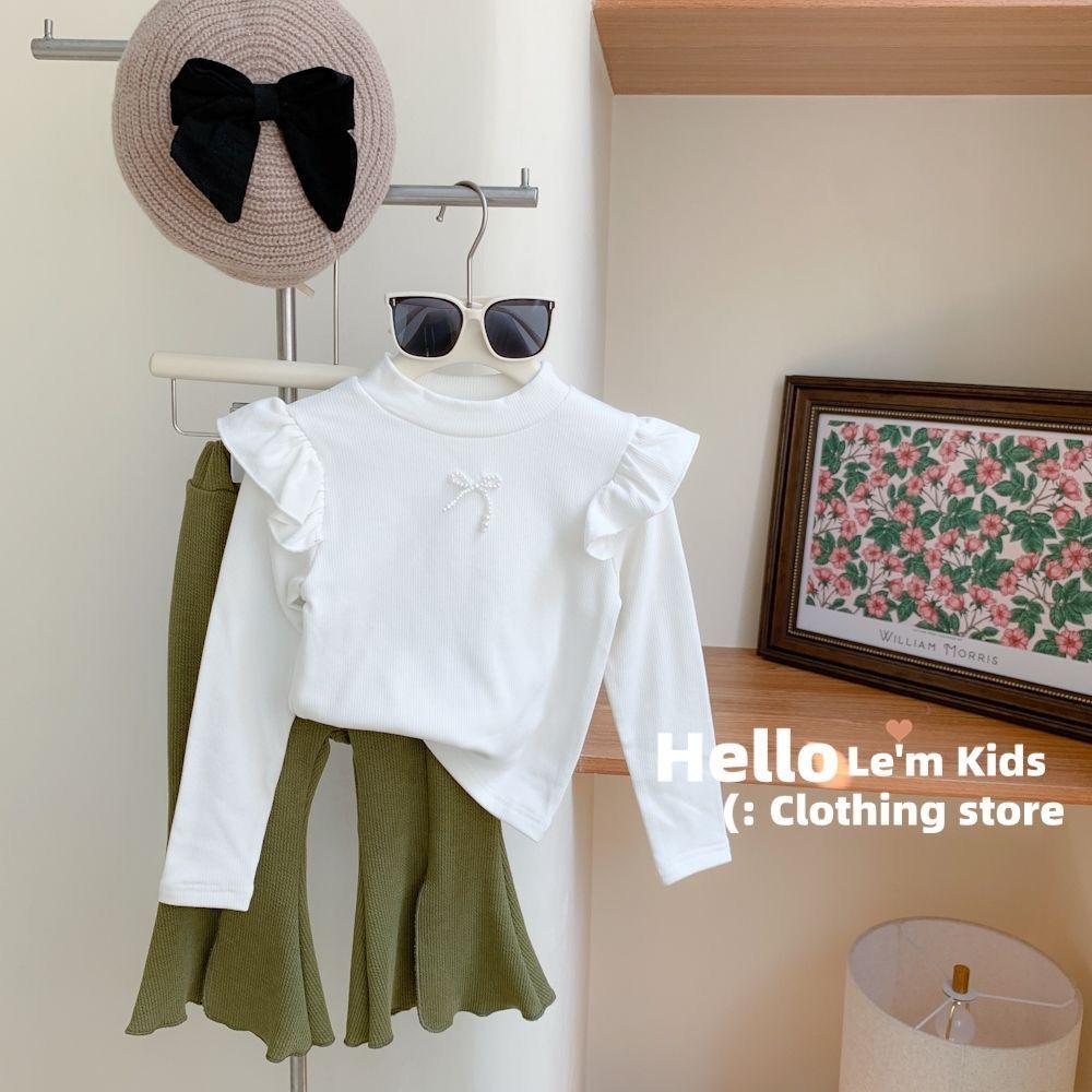  Spring and Autumn New Girls Korean Version All-match Sweet Three-dimensional Pearl Bow Knot Wood Ear Long-sleeved Bottom Shirt Fashion