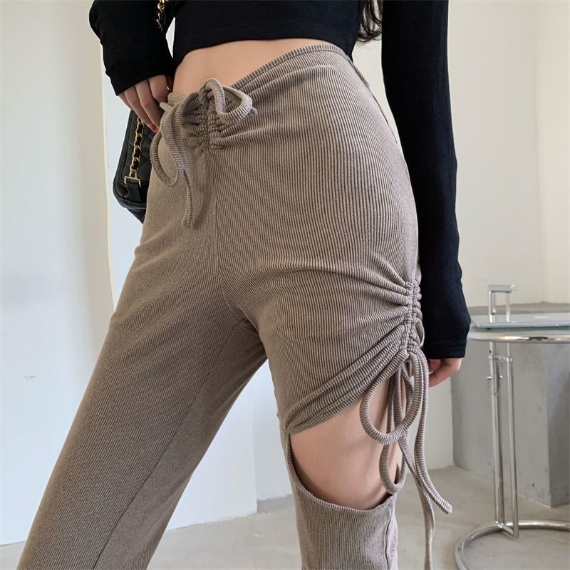 Design sense micro flared tie hollow casual pants women's spring and summer  new trousers high waist slim flared pants
