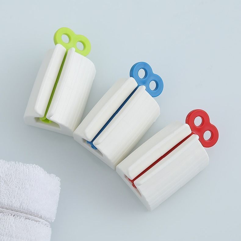 自动挤牙膏神器懒人洗面奶按压器手动牙膏夹子创意手动牙膏挤压器