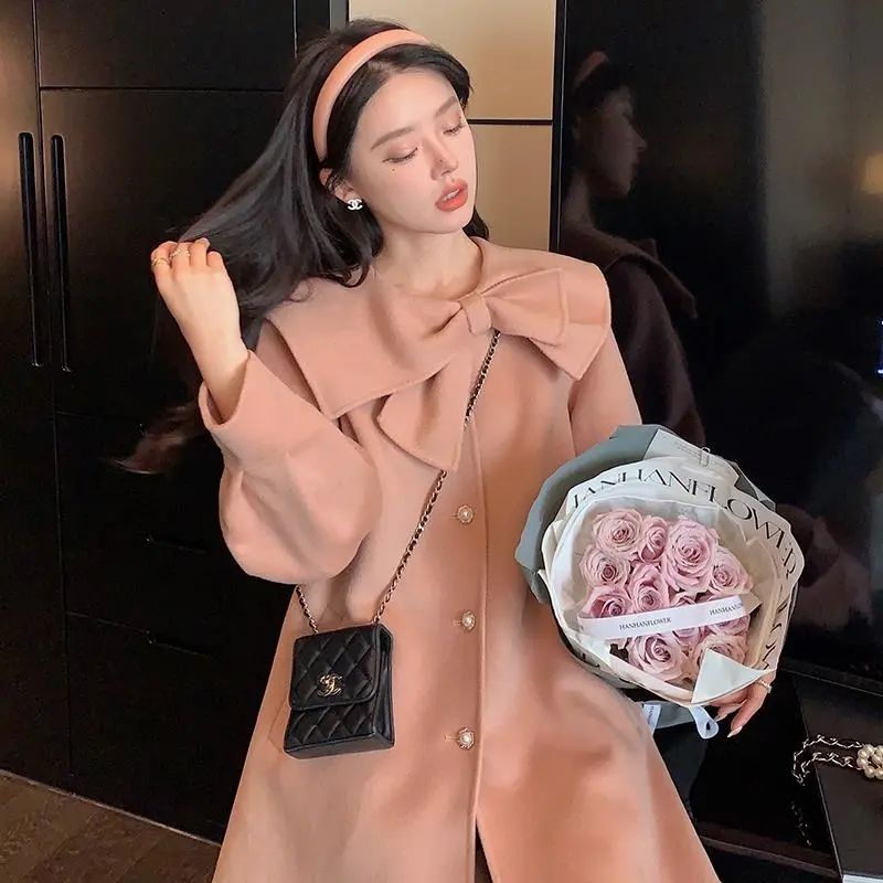 White bowknot coat women's winter new mid-length loose small sweet temperament cloak woolen coat