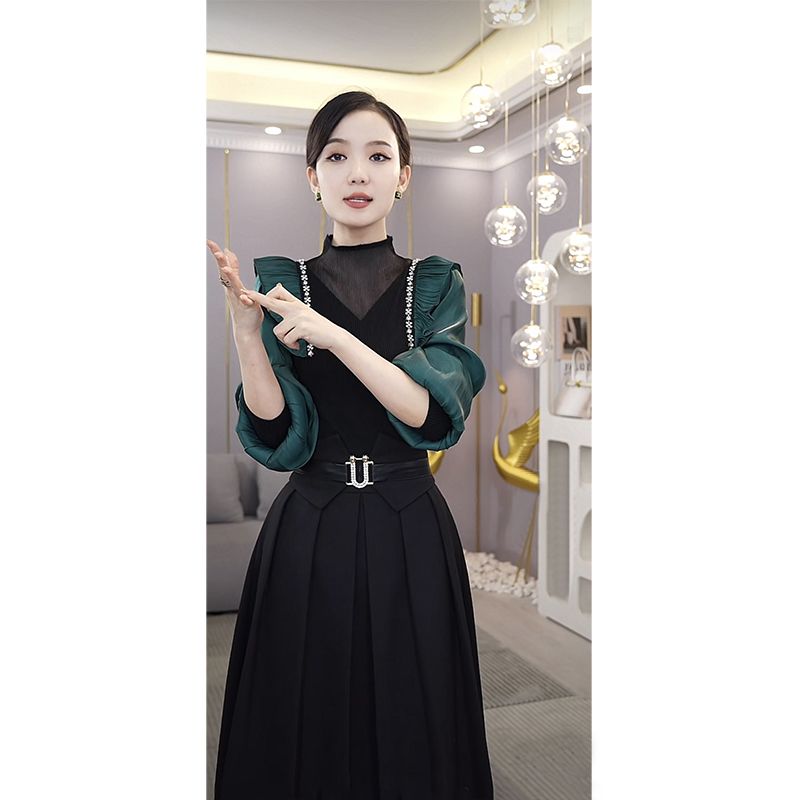 Light luxury and noble lotus leaf bead stitching top black pleated skirt high-end suit female two-piece set 2022 autumn