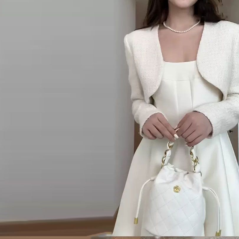 High-end white dress women's autumn clothing 2022 new temperament celebrity suspender skirt small fragrant wind suit autumn
