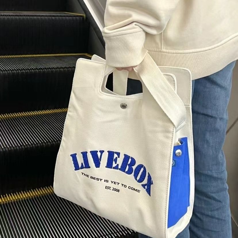 LIVEBOX college style Messenger bag female casual Japanese commuter shoulder bag student class portable canvas bag