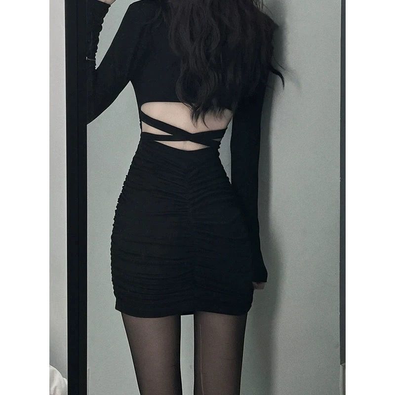 Pure desire wind dress women's autumn clothing 2022 new niche design sense backless thin black hot girl bag hip skirt