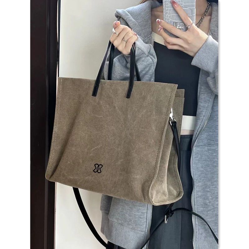 黛依女包 帆布包包女2022新款單肩斜挎包百搭大容量通勤手提包