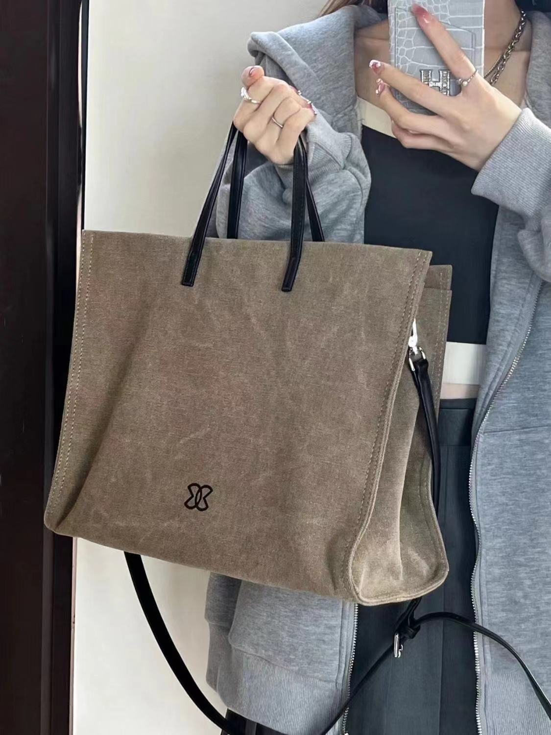 黛依女包 帆布包包女2022新款單肩斜挎包百搭大容量通勤手提包